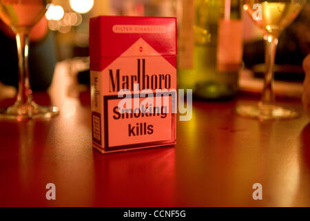 Oct 05, 2004; London, UK; A packet of Marlboro cigarettes on a table in a bar. Worldwide about three million people die from tobacco-related diseases each year. Smoking is an important public health issue. Researchers estimate that within 30 years the number of tobacco-related deaths will rise to 10 Stock Photo