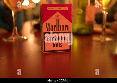 Oct 05, 2004; London, UK; A packet of Marlboro cigarettes on a table in a bar. Worldwide about three million people die from tobacco-related diseases each year. Smoking is an important public health issue. Researchers estimate that within 30 years the number of tobacco-related deaths will rise to 10 Stock Photo