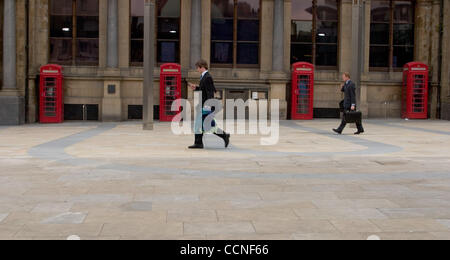 Oct 05, 2004; Leeds, UK; Red British phone box or call box in Leeds town centre. Leeds is a large city in the North of England. Stock Photo