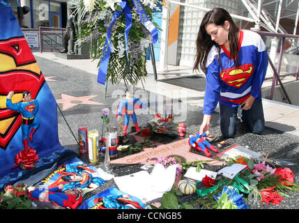 Oct 11, 2004; Hollywood, CA, USA; Fans gather at actor Christopher Reeve's star on the Hollywood Walk of Fame to pay their respects.  Reeve, 52, best known for his role as ''Superman'', as well as his lobbying efforts for better insurance protection against catastrophic injury and for spinal researc Stock Photo