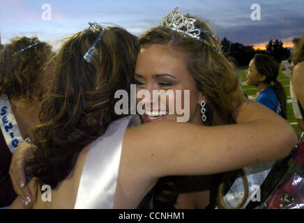 Natalie Pelletier (cq)(right) is congratulated after being named senior homecoming queen before the kick-off of the Clayton Valley vs. Liberty prep football game at Clayton Valley High School in Concord, Calif. on Friday, October 8, 2004.  (Dean Coppola / Contra Costa Times) Stock Photo