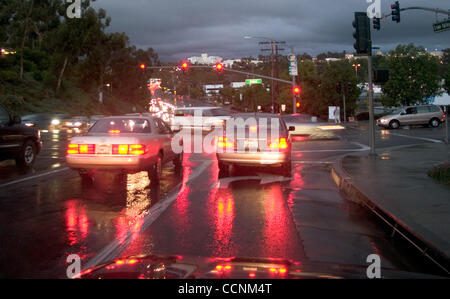 Nov 05, 2004; Los Angeles, CA, USA; Driving in wet conditions causes more accidents on highways. Hydraplaning and aquaplaning are common problems which lead to deaths on the road. Rainy weather influences road deaths in a far more complicated way than previously thought. Rain does not increase the n Stock Photo