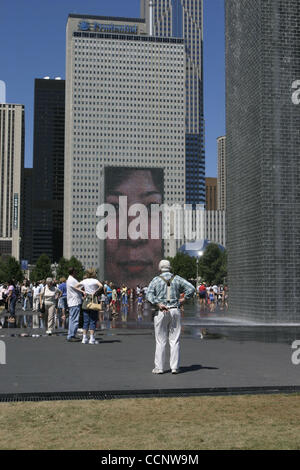 Aug 06, 2004; Chicago, IL, USA; Spanish conceptual artist Jaume Plensa's Crown Fountain at Chicago's new Millennium Park. Visitors to the park especially the children on this summer day enjoyed the fountain. Stock Photo