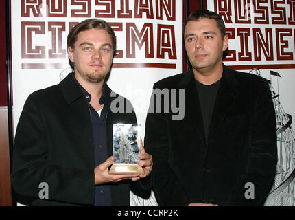 Apr. 20, 2003 - Hollywood, California, U.S. - I7568CHW.EXCLUSIVE-RUSSIAN INTERNATIONAL FILM FESTIVAL AWARDING LEONARDO DICAPRIO THE PRESTIGIOUS TOWER AWARD FOR HIS CONTRIBUTION TO WORLD CINEMA.ARCLIGHT HOLLYWOOD, HOLLYWOOD, CA .04/20/2003 .   /   /    2003 .LEONARDO DICAPRIO AND DENIS MOLTCHANOFF (1 Stock Photo