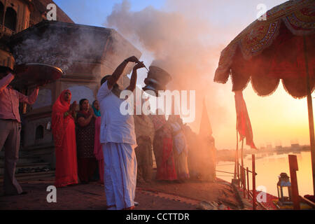 A daily  evening Aarti in praise of the Yamuna River is conducted on the ghats of the Yamuna river at Vrindavan. Stock Photo