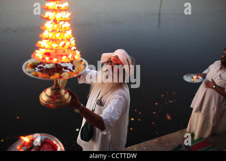 A daily  evening Aarti in praise of the Yamuna River is conducted on the ghats of the Yamuna river at Vrindavan. Stock Photo