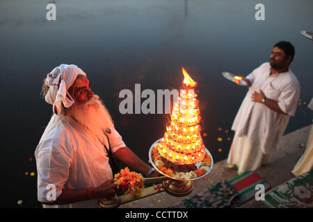 A daily  evening Aarti in praise of the Yamuna River is conducted on the ghats of the Yamuna river at Vrindavan. Stock Photo