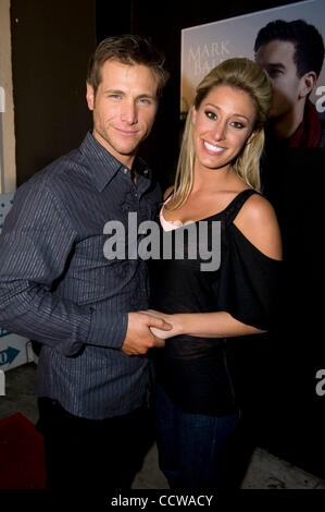 Apr 12, 2010 - Los Angeles, California, U.S. - JAKE PAVELKA and VIENNA GIRARDI of 'The Bachelor' arrive on the red carpet in support of 'Dancing With The Stars' 2 time champion M. Ballas for the release of his first solo project 'Waiting For Patience' at The Mint where he will take the stage with a  Stock Photo