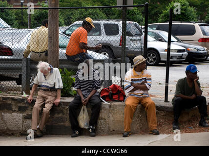 Atlanta, Georgia -- Homeless residents of the Peachtree and Pine shelter were told today that despite impending foreclosure on the 100,000 square-foot shelter, Atlanta's Task Force for the city's ever-increasing homeless situation hopes to keep it open -- somehow.    Task force leaders announced dur Stock Photo