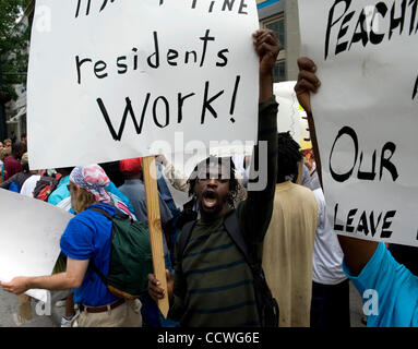 Atlanta, Georgia -- Homeless residents of the Peachtree and Pine shelter were told today that despite impending foreclosure on the 100,000 square-foot shelter, Atlanta's Task Force for the city's ever-increasing homeless situation hopes to keep it open -- somehow.    Task force leaders announced dur Stock Photo