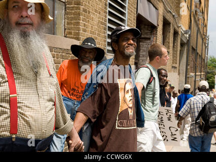 Atlanta, Georgia -- Homeless residents of the Peachtree and Pine shelter were told today that despite impending foreclosure on the 100,000 square-foot shelter, Atlanta's Task Force for the city's ever-increasing homeless situation hopes to keep it open -- somehow.    Task force leaders announced dur Stock Photo