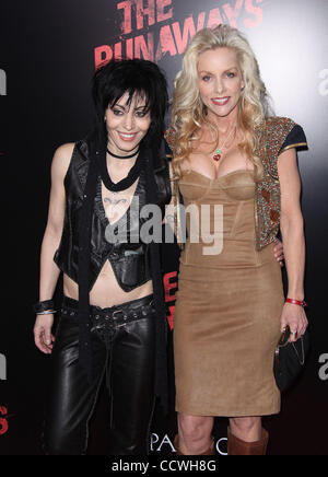 Mar 11, 2010 - Hollywood, California, USA - Musicians JOAN JETT & CHERIE CURRIE arriving to'The Runaways' Los Angeles Premiere held at the Cinerama Dome. (Credit Image: © Lisa O'Connor/ZUMA Press) Stock Photo