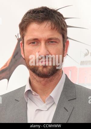 Mar 21, 2010 - Universal City, California, USA - Actor GERARD BUTLER arriving to the 'How To Train Your Dragon' Los Angeles Premiere held at the Gibson Amphitheatre. (Credit Image: Â© Lisa O'Connor/ZUMA Press) Stock Photo