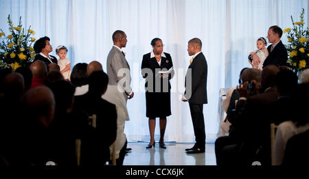 Mar 9,2010 - Washington, District of Columbia USA - .Couples who were among the first to apply for marriage licenses on the first day marriage equality became legal in the District of Columbia were legally married at The Human Rights Campaign headquarters...Reginald Stanley and Rocky Galloway, both  Stock Photo