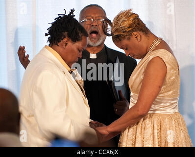 Mar 9,2010 - Washington, District of Columbia USA - .Couples who were among the first to apply for marriage licenses on the first day marriage equality became legal in the District of Columbia were legally married at The Human Rights Campaign headquarters...Angelisa Young and Sinjolya Townsend, both Stock Photo