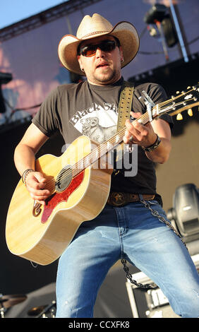 Apr 25, 2010 - Indio, California; USA - Musician JASON ALDEAN performs live as part of the 2010 Stagecoach California's Country Music Festival that is taking place at the Empire Polo Field.  The two day festival will attract thousands of country music fans to see a variety of artist on three differe Stock Photo