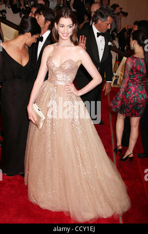 Actress ANNE HATHAWAY attends the Metropolitan's Museum of Art Costume Institute Gala Benefit for the opening of the new exhibit 'American Woman: Fashioning A National Identity'. Stock Photo