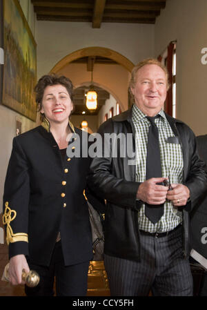 Mar 01, 2010 - Santa Barbara, California, USA - Actor RANDY QUAID and his wife EVI QUAID after appearing at a preliminary hearing in Superior Court in Santa Barbara on charges of skipping out on a $10,000 hotel bill, which they say they have since paid. In her hand, Evi Quaid carries a Golden Globe  Stock Photo