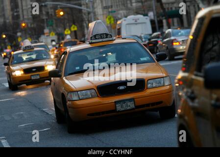 Mar 17, 2010 - New York, New York, U.S. - Yellow and black taxi cabs driving the streets of the city. (Credit Image: Â© Angel Chevrestt/ZUMA Press) Stock Photo