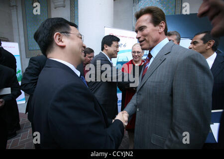 Wang Chuanfu, chairman of Chinese manufacturer BYD Auto Company Limited (BYD) joins California Governor Arnold Schwarzenegger and Los Angeles Mayor Antonio Villagraigosa in press confrence to announce that BYD, a leader in electric and hybrid vehicles and other renewable energy products, will locate Stock Photo