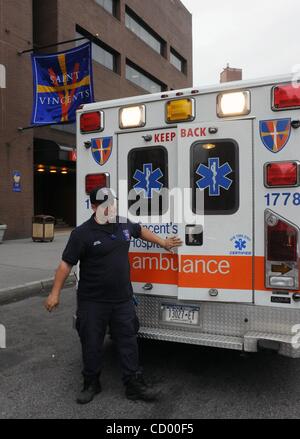 Apr 09, 2010 - Manhattan, New York, USA - 14 year veteran Paramedic Eddie Moore following the first half of a double-shift, he bussed an injured police officer to St. Vincent's at 9:57 a.m. As of 10 a.m. this morning the Fire Department has stopped sending ambulances to St. Vincent's Catholic Medica Stock Photo