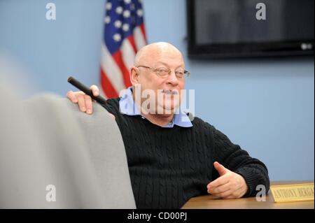 Apr 17, 2010 - Manhattan, New York, USA - OTB board member ANTHONY BERGAMO with a cigar as New York City Off-Track Betting (OTB) Corporation Board votes to remain open for another year in a special meeting this morning at their Times Square headquarters. As part of the announcement 1,300 workers wil Stock Photo