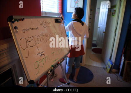 JUMP IMPORTANT - SPELLING BEE --   Josephine Kao, 12, closes a window in her study room on Tuesday, March 25, 2008 at her Roseville. A board near her spelled out the German words gesamtkunstwerk, and gemutlichkeit, which are her current favorite words that she feels will be in one of her spelling ch Stock Photo