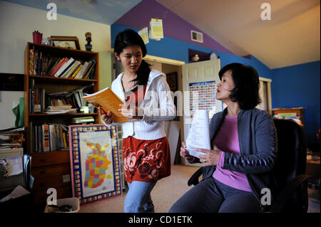JUMP IMPORTANT - SPELLING BEE --  Josephine Kao, 12, has a discussion with her mother Peggy on Tuesday, March 25, 2008 at their Roseville home as she prepares to study for a math test.  ( The Sacramento Bee /   Hector Amezcua /  hamezcua@sacbee.com ) Stock Photo