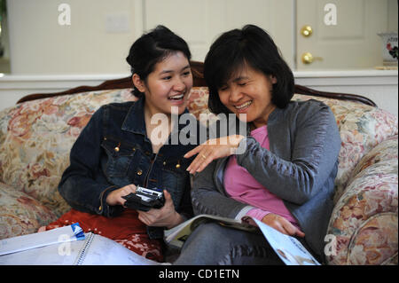 SPELLING BEE --   Josephine Kao, 12, shares some words with her mother Peggy, during a piano lesson on Tuesday, March 25, 2008 in Roseville. Kao, is a three time Regional Spelling Bee Champion that started in spelling competitions with the help of her mother, who is her main companion on her journey Stock Photo