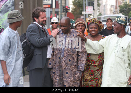 Oct 27, 2008; San Francisco, CA, USA; BERT VOORHEES, lead trial lawyer (in suit) and LARRY BOWOTO  (center) exit Federal Building after opening day of human rights lawsuit against Chevron. In Bowoto vs. Chevron, Chevron is charged with the killing of unarmed Nigerians who protested environmental and Stock Photo