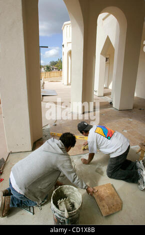 November 3, 2008, Escondido, CA, USA Tile setters PASCUAL MENDOZA, left, and MANUEL MEJIA work on the main entryway of the nearly completed Sikh Society of San Diego's temple Credit: photo by Charlie Neuman, San Diego Union-Tribune/Zuma Press. copyright 2008 San Diego Union-Tribune Stock Photo