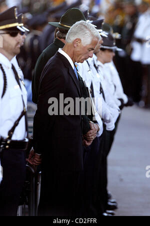 120507 pbso tj 2 -- Palm Beach Post staff photo by Taylor Jones/0045802D. FOR TEAM COVERAGE. SUBURBAN WEST PALM BEACH. Gov. Charlie Crist waits for the procession of the caskets. Funeral of Palm Beach County Sheriff's Office deputies Donta Manuel and Jonathan Wallace(cq) at Sound Advice Ampitheatre  Stock Photo