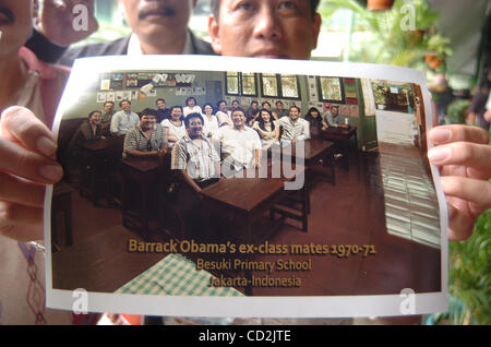 BARRACK OBAMA's  ex -Classmates shows picture during support to BARRY a known as  BARRACK OBAMA as US President Candidate at Menteng 01 Elementary School in Jakarta, Indonesia, March 08,2008 . During his early childhood Democratic presidential candidate Sen. Barack  Obama lived in Indonesia for four Stock Photo