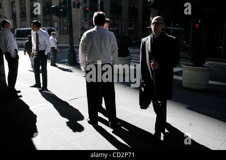 Many cigarrettes breaks for employees at Bear Stearns today. Bear Stearns Headquarters in New York City March, 17 2008. Concerns about the fallout from the bargain-basement sale of Bear Stearns to JPMorgan Chase drove Asian and Europe stocks lower, and U.S. futures plunged overnight.Many cigarrettes Stock Photo