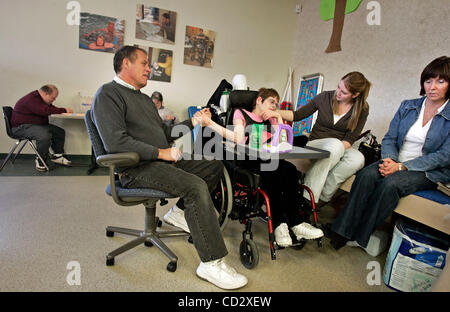 Anoka, MN - March 20, 2008-] Stephanie Helle pulls the hand of her ...