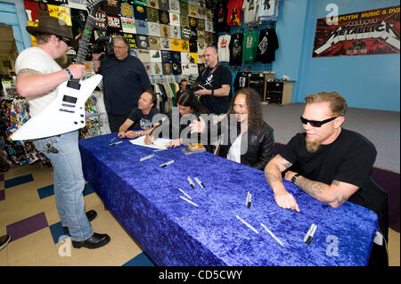 Apr 19, 2008 - Mountain View, California, USA - The heavy metal band Metallica officially launched Record Store Day, with an in-store signing and fan meet and greet at Rasputin Music in Mountain View, California, the band's first in-store appearance in nearly a decade. PICTURED: JAMES HETFIELD, LARS Stock Photo