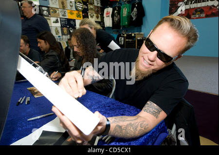 Apr 19, 2008 - Mountain View, California, USA - The heavy metal band Metallica officially launched Record Store Day, with an in-store signing and fan meet and greet at Rasputin Music in Mountain View, California, the band's first in-store appearance in nearly a decade. PICTURED: JAMES HETFIELD, LARS Stock Photo