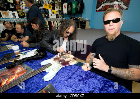 Apr 19, 2008 - Mountain View, California, USA - The heavy metal band Metallica officially launched Record Store Day, with an in-store signing and fan meet and greet at Rasputin Music in Mountain View, California, the band's first in-store appearance in nearly a decade. PICTURED: JAMES HETFIELD, LARS Stock Photo