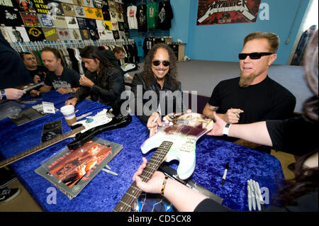 Apr 19, 2008 - Mountain View, California, USA - The heavy metal band Metallica officially launched Record Store Day, with an in-store signing and fan meet and greet at Rasputin Music in Mountain View, California, the band's first in-store appearance in nearly a decade. PICTURED: JAMES HETFIELD, LARS Stock Photo