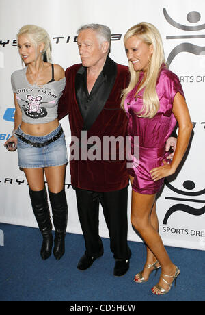 July 14, 2008 - Holmby Hills, California, U.S. - Jul 14, 2008 - Holmby Hills, California, USA - Playboy Playmate HOLLY MADISON, Playboy founder HUGH HEFNER, and television personality BRIDGET MARQUARD on the 'Blu' carpet for the Playboy and Blu-Ray Pre-ESPY Awards Pool Party at the Playboy Mansion o Stock Photo