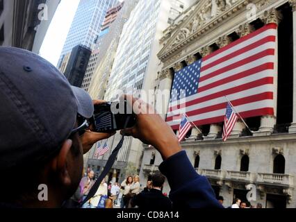 Oct 10, 2008 - Manhattan, New York, USA - Visitors take photos outside the New York Stock Exchange as the Dow Jones closes down 128 points to 8,451.19, following a roller coaster session, ending the worst week ever on Wall Street.  (Credit Image: Â© Bryan Smith/ZUMA Press) RESTRICTIONS:  * New York  Stock Photo