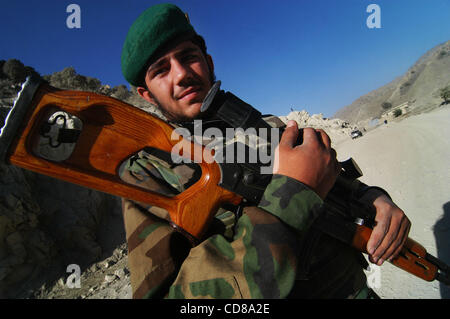 Oct 10, 2008 - Paktya, Afghanistan - Afghan National Army soldier cradling his Dragonov sniper rifle during a patrol in eastern Afghanistan. (Credit Image: © Paul Avallone/ZUMA Press) Stock Photo