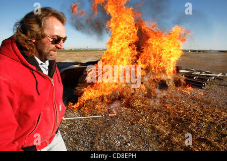 Oct 28, 2008 - Topeka, Kansas, USA - A fire is lit to simulate a tanker truck fire during a mass casualty disaster drill at Forbes Field in Topeka, Kansas. Several Shawnee and Douglas county emergency agencies conducted the disaster exercise at Forbes Field to train with Department of Homeland Secur Stock Photo