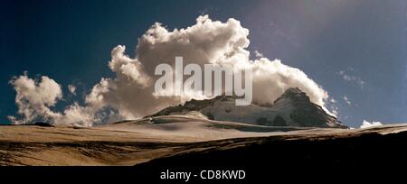 Nov 21, 2008 - Bariloche, Rio Nego, Argentina - Clouds pour over the peak at Cerro Tronador, the nearside located in Argentina and the farside in Chile. Taken ouside of Bariloche, Argnetina, March 2008. (Credit Image: © Caitlin M Kelly/ZUMA Press) Stock Photo