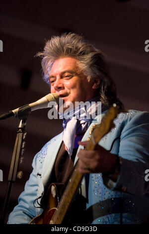 Grand Ole Opry member Marty Stuart and His Fabulous Superlatives band perform during the Lakefest Fourth of July Celebration. Stuart is widely considered to be one of country music's most eclectic artists because of the diversity of his repertoire. Stock Photo