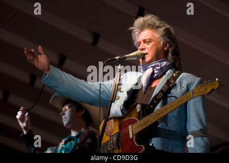 Grand Ole Opry member Marty Stuart and His Fabulous Superlatives band perform during the Lakefest Fourth of July Celebration. Stuart is widely considered to be one of country music's most eclectic artists because of the diversity of his repertoire. Stock Photo