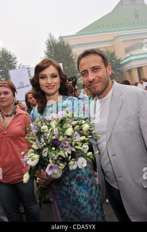 English singer, songwriter and model Sophie Michelle Ellis Bextor with a companion attends celebrations of 15th anniversary of Serebryanny Dozhd radio station in Moscow. Stock Photo