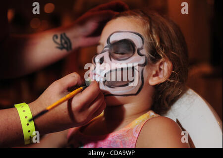 Aug. 15, 2010 - Deerfield Beach, FL - Florida, USA - United States - (CAV) TATTOO 0815J.CAV Skyanne Hune, age 5, of Coconut Creek, gets her face painted during the 15th Annual South Florida Tattoo Expo, Sunday, Aug. 15, at the Hilton in Deerfield Beach.  Joe Cavaretta, Sun Sentinel (Credit Image: ©  Stock Photo