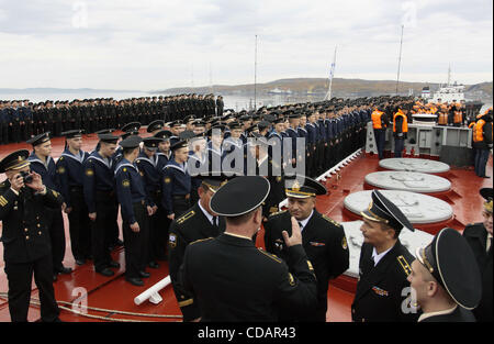 Sep 12, 2010-Severomorsk, Russia- The heavy nuclear missile cruiser of the Northern Fleet 'Peter Velikiy'( Peter the Great) returned to the main base of the Northern Fleet, Severomorsk on Sunday after a long voyage, which lasted six months. In a solemn meeting of the cruiser took part: the commander Stock Photo