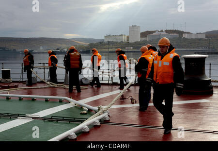 Sep 12, 2010-Severomorsk, Russia- The heavy nuclear missile cruiser of the Northern Fleet 'Peter Velikiy'( Peter the Great) returned to the main base of the Northern Fleet, Severomorsk on Sunday after a long voyage, which lasted six months. In a solemn meeting of the cruiser took part: the commander Stock Photo